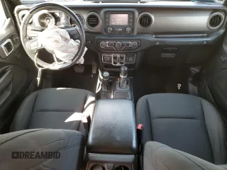 2018 Jeep Wrangler Unlimited Sport S with VIN 1C4HJXDG9JW273212, listed as a Copart auction lot 57762035 with 79,678 mi miles and Salvage title. Bid and sale history available at DreamBid. Image 8.