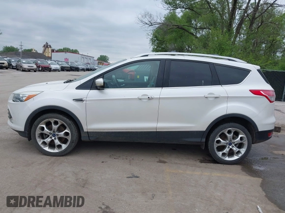2016 Ford Escape Titanium with VIN 1FMCU9J96GUB97564, listed as a IAAI auction lot 42137663 with 269,009 mi miles. Bid and sale history available at carsss.com. Image 14.