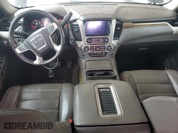 2016 GMC Yukon Denali with VIN 1GKS2CKJ0GR366206, listed as a Copart auction lot 52105185 with 150,141 mi miles and Salvage Title. Bid and sale history available at carsss.com. Image 8.