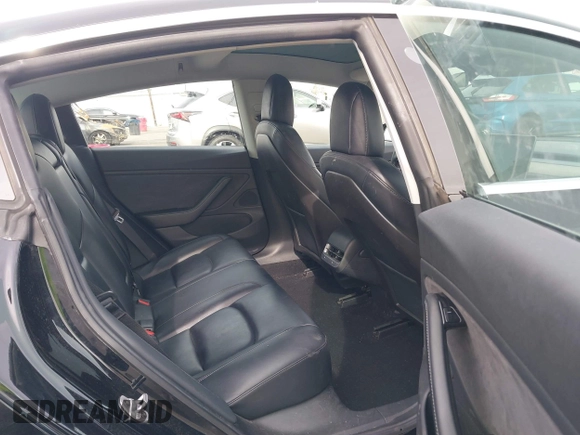 2020 Tesla Model 3 Long Range z VIN 5YJ3E1EB0LF600098, wystawiony jako IAAI lot #41071258 z przebiegiem 149 939 mil mil oraz . Historia ofert i sprzedaży dostępna na DreamBid. Obrazek 8.