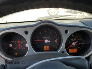 2004 Nissan 350Z Touring z VIN JN1AZ34E94T062960, wystawiony jako Copart lot #55822235 z przebiegiem 186 879 mil mil oraz Szkoda całkowita • Salvage title. Historia ofert i sprzedaży dostępna na DreamBid. Obrazek 9.