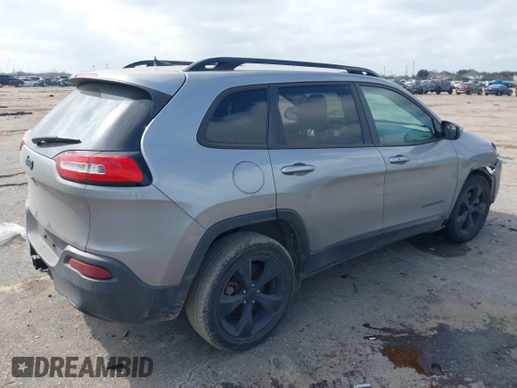 2016 Jeep Cherokee Latitude with VIN 1C4PJLCB3GW107402, listed as a IAAI auction lot 41505242 with 110,994 mi miles. Bid and sale history available at carsss.com. Image 4.