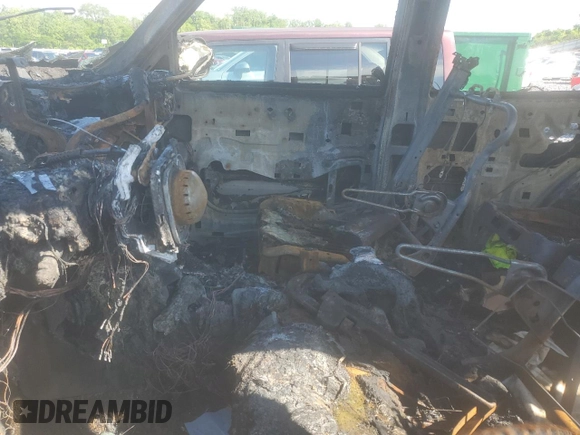 2003 Chevrolet Tahoe LS z VIN 1GNEC13Z03J273863, wystawiony jako Copart lot #56574255 z przebiegiem Nie podano mil oraz Szkoda całkowita • Salvage title. Historia ofert i sprzedaży dostępna na DreamBid. Obrazek 7.