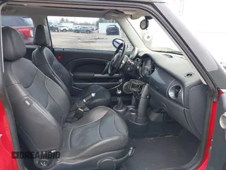 2003 MINI Hardtop with VIN WMWRC33413TC48601, listed as a IAAI auction lot 41418901 with 57,095 mi miles and . Bid and sale history available at DreamBid. Image 5.