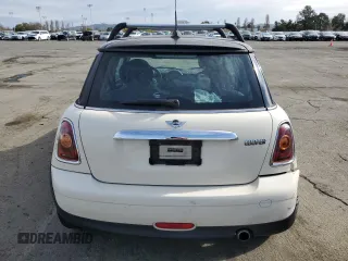 2010 MINI Hardtop with VIN WMWMF3C57ATU77370, listed as a Copart auction lot 50078605 with 187,187 mi miles and Salvage title. Bid and sale history available at DreamBid. Image 6.
