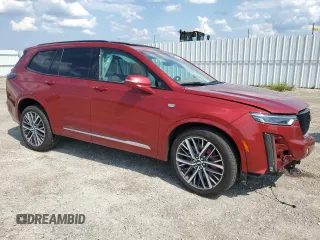 2024 Cadillac XT6 AWD Sport z VIN 1GYKPHRS0RZ724524, wystawiony jako Copart lot #61333185 z przebiegiem 12 799 mil mil oraz Nie do naprawy • Non repairable. Historia ofert i sprzedaży dostępna na DreamBid. Obrazek 4.