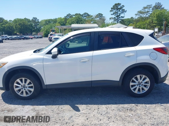 2013 Mazda CX-5 Touring with VIN JM3KE4CE8D0156843, listed as a IAAI auction lot 42018321 with 143,396 mi miles. Bid and sale history available at carsss.com. Image 14.