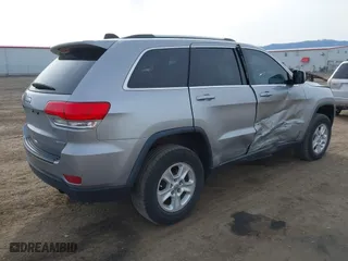 2015 Jeep Grand Cherokee Altitude with VIN 1C4RJFAG7FC905779, listed as a IAAI auction lot 42013150 with 95,018 mi miles. Bid and sale history available at carsss.com. Image 4.
