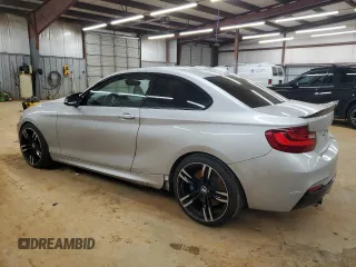 2015 BMW 2 Series 228i with VIN WBA1F5C54FV343572, listed as a Copart auction lot 45879685 with 90,715 mi miles and Salvage Title. Bid and sale history available at carsss.com. Image 2.