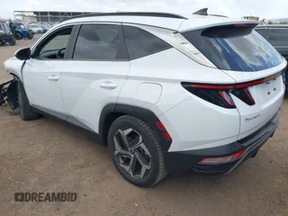 2022 Hyundai Tucson SEL z VIN 5NMJF3AE2NH062926, wystawiony jako IAAI lot #41969902 z przebiegiem 41 882 mil mil oraz . Historia ofert i sprzedaży dostępna na DreamBid. Obrazek 3.