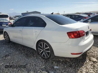 2012 Volkswagen Jetta GLI Autobahn with VIN 3VW5A7AJXCM087214, listed as a Copart auction lot 75011884 with 127,079 mi miles and Salvage title. Bid and sale history available at DreamBid. Image 2.