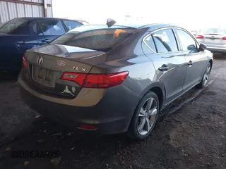 2014 Acura ILX Premium with VIN 19VDE1F51EE006621, listed as a IAAI auction lot 41984539 with 165,585 mi miles and . Bid and sale history available at DreamBid. Image 4.
