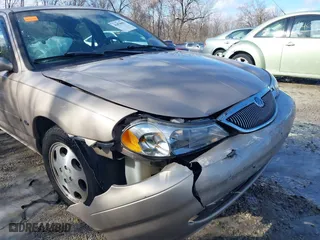 1999 Mercury Mystique GS with VIN 1MEFM6530XK635463, listed as a IAAI auction lot 41478903 with 87,911 mi miles. Bid and sale history available at carsss.com. Image 6.