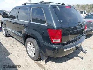 2005 Jeep Grand Cherokee Limited with VIN 1J8HR58245C519482, listed as a IAAI auction lot 41799890 with 180,486 mi miles. Bid and sale history available at carsss.com. Image 3.