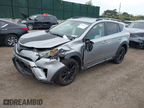 2018 Toyota RAV4 XLE with VIN 2T3RFREV1JW718474, listed as a IAAI auction lot 42144572 with 62,852 mi miles and . Bid and sale history available at DreamBid. Image 2.