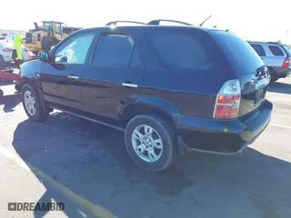 2004 Acura MDX Touring Pkg RES w/Nav with VIN 2HNYD18924H537044, listed as a IAAI auction lot 41368325 with 134,549 mi miles. Bid and sale history available at carsss.com. Image 3.