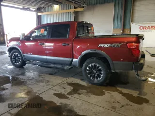 2017 Nissan Titan Platinum Reserve with VIN 1N6AA1E52HN501110, listed as a Copart auction lot 48202935 with 83,674 mi miles and Salvage title. Bid and sale history available at DreamBid. Image 2.