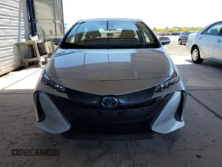 2021 Toyota Prius LE z VIN JTDKAMFP6M3183538, wystawiony jako Copart lot #54267425 z przebiegiem 29 374 mil mil oraz Szkoda całkowita • Salvage title. Historia ofert i sprzedaży dostępna na DreamBid. Obrazek 5.