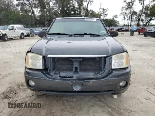 2006 GMC Envoy SLE with VIN 1GKDS13S562135135, listed as a Copart auction lot 88353995 with 159,251 mi miles and Salvage Title. Bid and sale history available at carsss.com. Image 5.