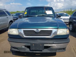 1998 Mazda B-Series Truck SX with VIN 4F4YR12C4WTM03287, listed as a IAAI auction lot 42182560 with 94,609 mi miles and . Bid and sale history available at DreamBid. Image 12.