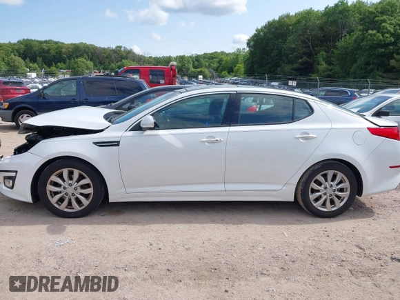 2015 Kia Optima EX with VIN 5XXGN4A77FG497218, listed as a IAAI auction lot 42464839 with 128,355 mi miles and . Bid and sale history available at DreamBid. Image 14.