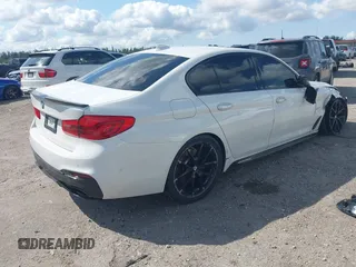 2018 BMW 5 Series 540i with VIN WBAJE5C50JWA95412, listed as a IAAI auction lot 41502258 with 74,150 mi miles and . Bid and sale history available at carsss.com. Image 4.