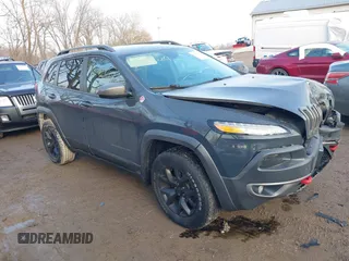 2017 Jeep Cherokee Trailhawk z VIN 1C4PJMBS4HW647852, wystawiony jako IAAI lot #41192324 z przebiegiem 116 429 mil mil oraz . Historia ofert i sprzedaży dostępna na DreamBid. Obrazek 1.