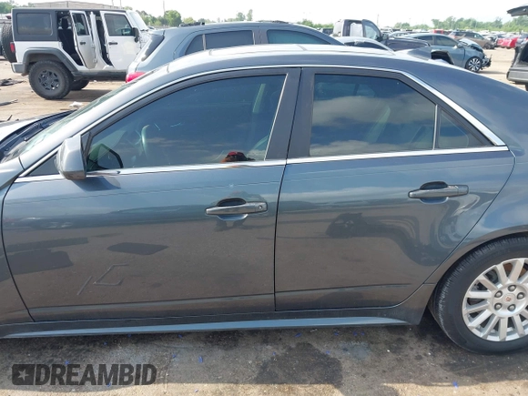 2011 Cadillac CTS Luxury with VIN 1G6DF5EYXB0151106, listed as a IAAI auction lot 42107070 with 140,468 mi miles and . Bid and sale history available at DreamBid. Image 14.