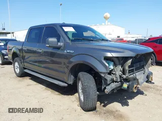2015 Ford F-150 XLT with VIN 1FTEW1EF4FKE72884, listed as a IAAI auction lot 41833903 with 196,597 mi miles. Bid and sale history available at carsss.com. Image 1.
