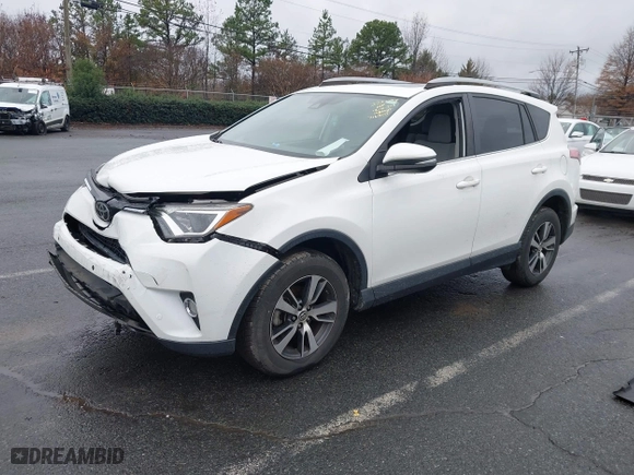 2017 Toyota RAV4 XLE with VIN JTMRFREV6HJ716907, listed as a IAAI auction lot 41056444 with 118,335 mi miles. Bid and sale history available at carsss.com. Image 17.