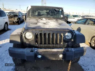 2017 Jeep Wrangler Willys Wheeler with VIN 1C4AJWAG2HL638213, listed as a Copart auction lot 88121675 with 62,760 mi miles and Salvage Title. Bid and sale history available at DreamBid. Image 5.