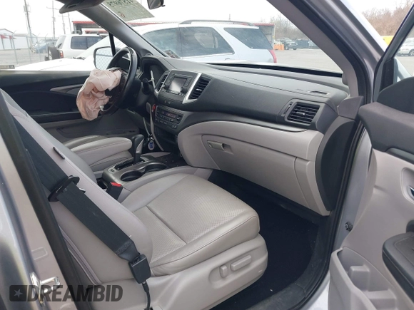 2019 Honda Ridgeline RTL with VIN 5FPYK2F50KB004055, listed as a IAAI auction lot 41576975 with 128,620 mi miles and . Bid and sale history available at DreamBid. Image 5.