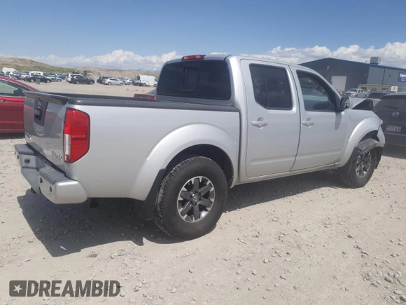 2016 Nissan Frontier S with VIN 1N6AD0EV8GN721786, listed as a Copart auction lot 54417415 with 100,672 mi miles and Salvage title. Bid and sale history available at DreamBid. Image 3.