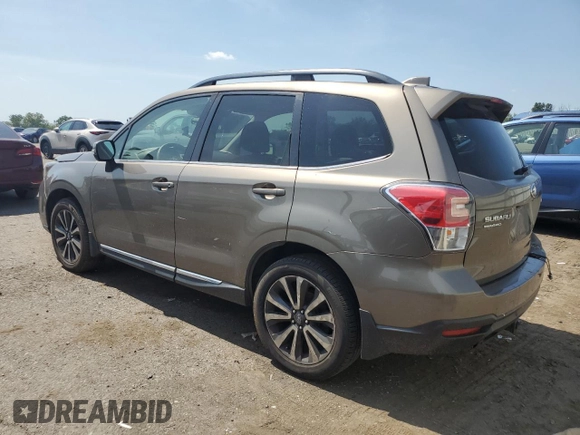 2017 Subaru Forester Touring with VIN JF2SJGWC9HH402713, listed as a Copart auction lot 62257345 with 128,903 mi miles and Salvage title. Bid and sale history available at DreamBid. Image 2.