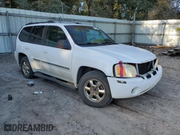 2002 GMC Envoy SLT with VIN 1GKDS13S822460095, listed as a Copart auction lot 77004764 with 267,716 mi miles and Salvage Title. Bid and sale history available at carsss.com. Image 4.