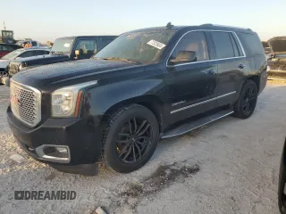 2015 GMC Yukon Denali with VIN 1GKS2CKJ5FR529091, listed as a Copart auction lot 77325934 with 0 mi miles and Clean Title. Bid and sale history available at carsss.com. Image 1.