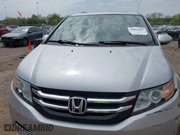 2014 Honda Odyssey EX-L with VIN 5FNRL5H60EB115792, listed as a IAAI auction lot 42064607 with 191,055 mi miles and . Bid and sale history available at carsss.com. Image 12.