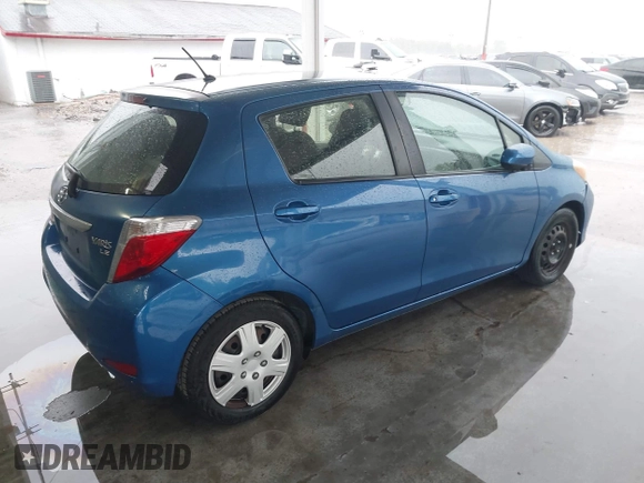 2013 Toyota Yaris L with VIN JTDKTUD33DD545913, listed as a IAAI auction lot 41752043 with 201,236 mi miles. Bid and sale history available at carsss.com. Image 4.
