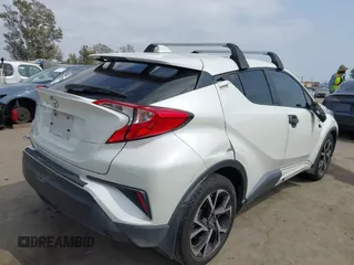 2019 Toyota C-HR XLE with VIN JTNKHMBX9K1054053, listed as a IAAI auction lot 42120256 with 67,083 mi miles and . Bid and sale history available at DreamBid. Image 4.