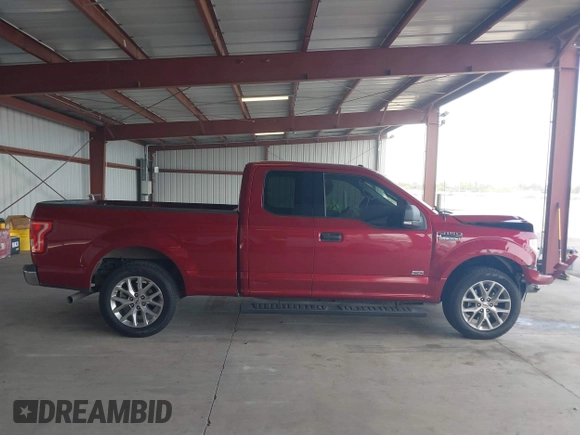 2015 Ford F-150 XL with VIN 1FTEX1CP1FFC30569, listed as a IAAI auction lot 41836652 with 126,443 mi miles. Bid and sale history available at carsss.com. Image 14.