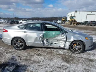 2016 Ford Fusion Titanium with VIN 3FA6P0K96GR101285, listed as a IAAI auction lot 41214633 with 113,633 mi miles and . Bid and sale history available at carsss.com. Image 13.