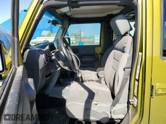 2008 Jeep Wrangler Rubicon z VIN 1J8GA69158L561579, wystawiony jako Copart lot #57525905 z przebiegiem 201 550 mil mil oraz Szkoda całkowita • Salvage title. Historia ofert i sprzedaży dostępna na DreamBid. Obrazek 7.