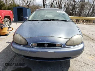1999 Mercury Sable GS with VIN 1MEFM50U1XA653292, listed as a Copart auction lot 51307905 with 210,945 mi miles and Salvage title. Bid and sale history available at DreamBid. Image 5.