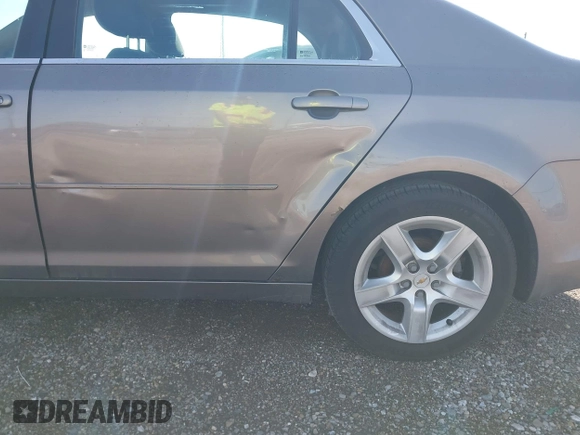 2012 Chevrolet Malibu 1LS with VIN 1G1ZB5E01CF193292, listed as a IAAI auction lot 42146689 with 240,073 mi miles and . Bid and sale history available at DreamBid. Image 6.
