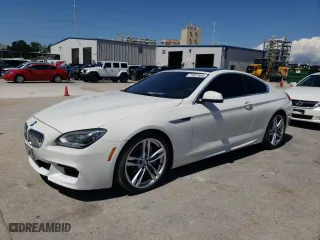 2012 BMW 6 Series 650i with VIN WBALX3C59CC528427, listed as a Copart auction lot 71097654 with 96,036 mi miles and Salvage Title. Bid and sale history available at carsss.com. Image 1.