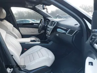 2014 Mercedes-Benz M 63 AMG z VIN 4JGDA7EBXEA306024, wystawiony jako IAAI lot #41452811 z przebiegiem 98 510 mil mil oraz . Historia ofert i sprzedaży dostępna na DreamBid. Obrazek 5.