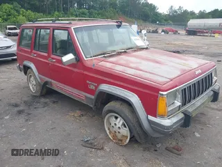 1991 Jeep Cherokee z VIN 1J4FJ58SXML632724, wystawiony jako IAAI lot #42228652 z przebiegiem 287 840 mil mil oraz . Historia ofert i sprzedaży dostępna na DreamBid. Obrazek 1.