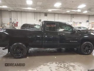 2015 Chevrolet Silverado 1500 LT with VIN 1GCVKREC2FZ417244, listed as a IAAI auction lot 41267554 with 87,735 mi miles and . Bid and sale history available at DreamBid. Image 13.