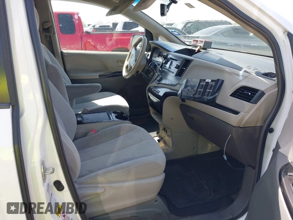 2014 Toyota Sienna LE with VIN 5TDJK3DC5ES081232, listed as a IAAI auction lot 41789629 with 397,033 mi miles and . Bid and sale history available at DreamBid. Image 5.