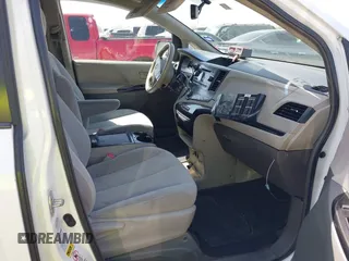 2014 Toyota Sienna LE with VIN 5TDJK3DC5ES081232, listed as a IAAI auction lot 41789629 with 397,033 mi miles and . Bid and sale history available at DreamBid. Image 5.
